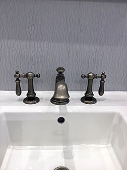 Kohler Co. ARTIFACTS® bell faucet with swing lever handles in Vibrant Polished Nickel